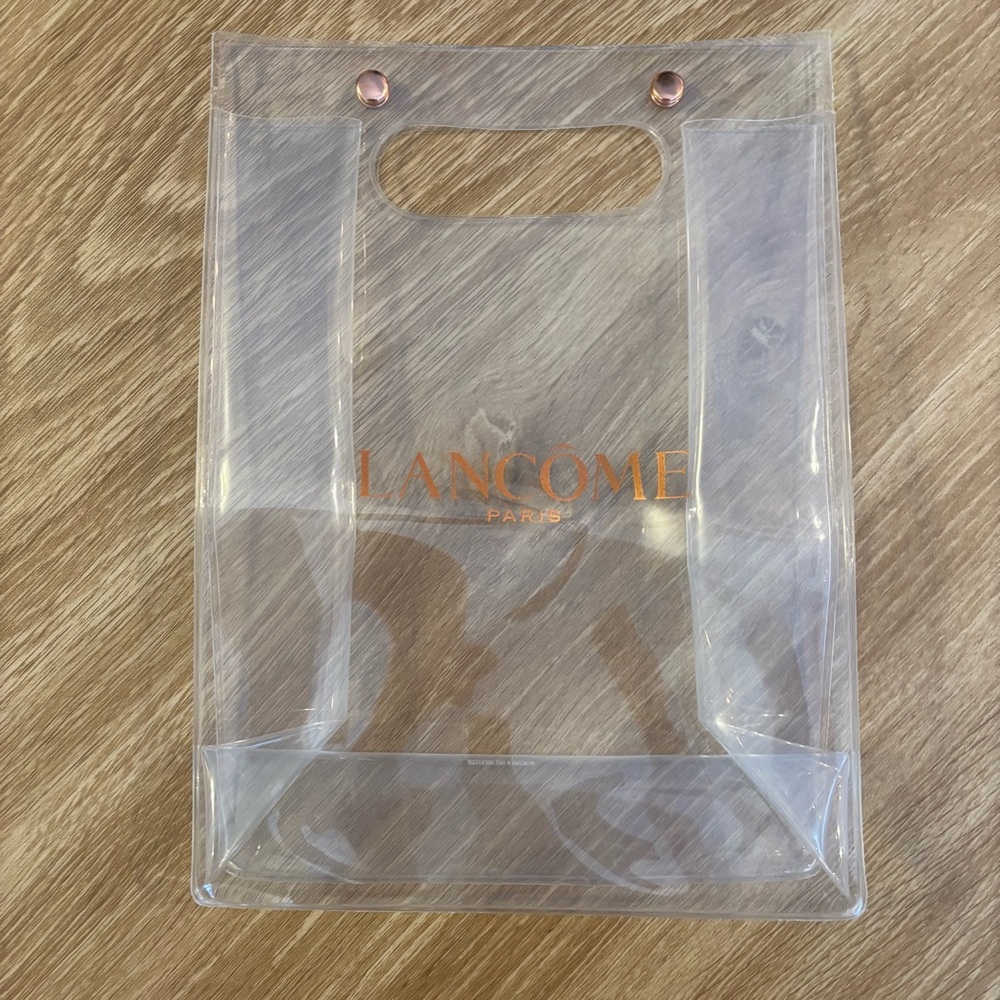 Lancome Clear and gold bag